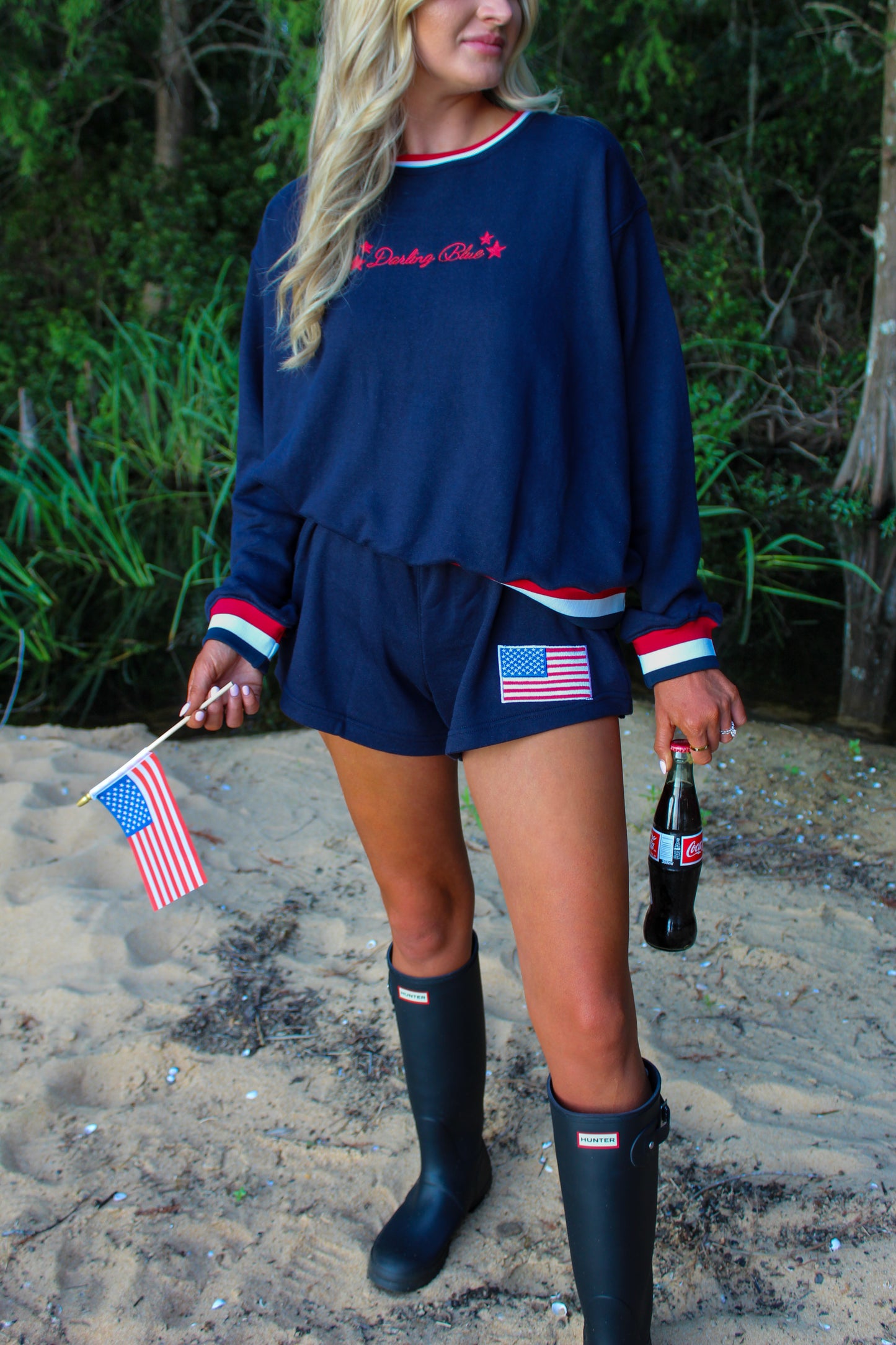Navy blue women's lounge set with American flag patches, cozy fabric, perfect for casual outings.