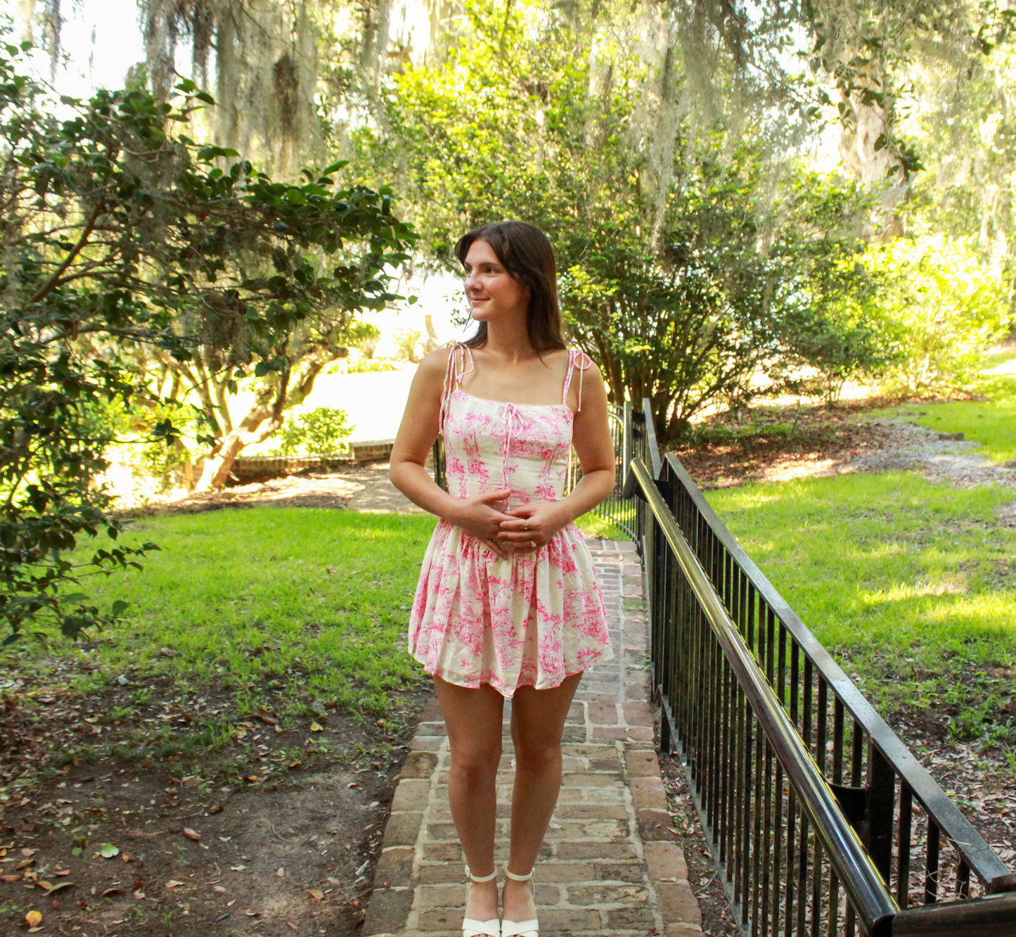 Light pink floral summer dress with adjustable straps, perfect for casual outings or beach days.